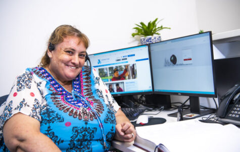 Woman sitting with headphones